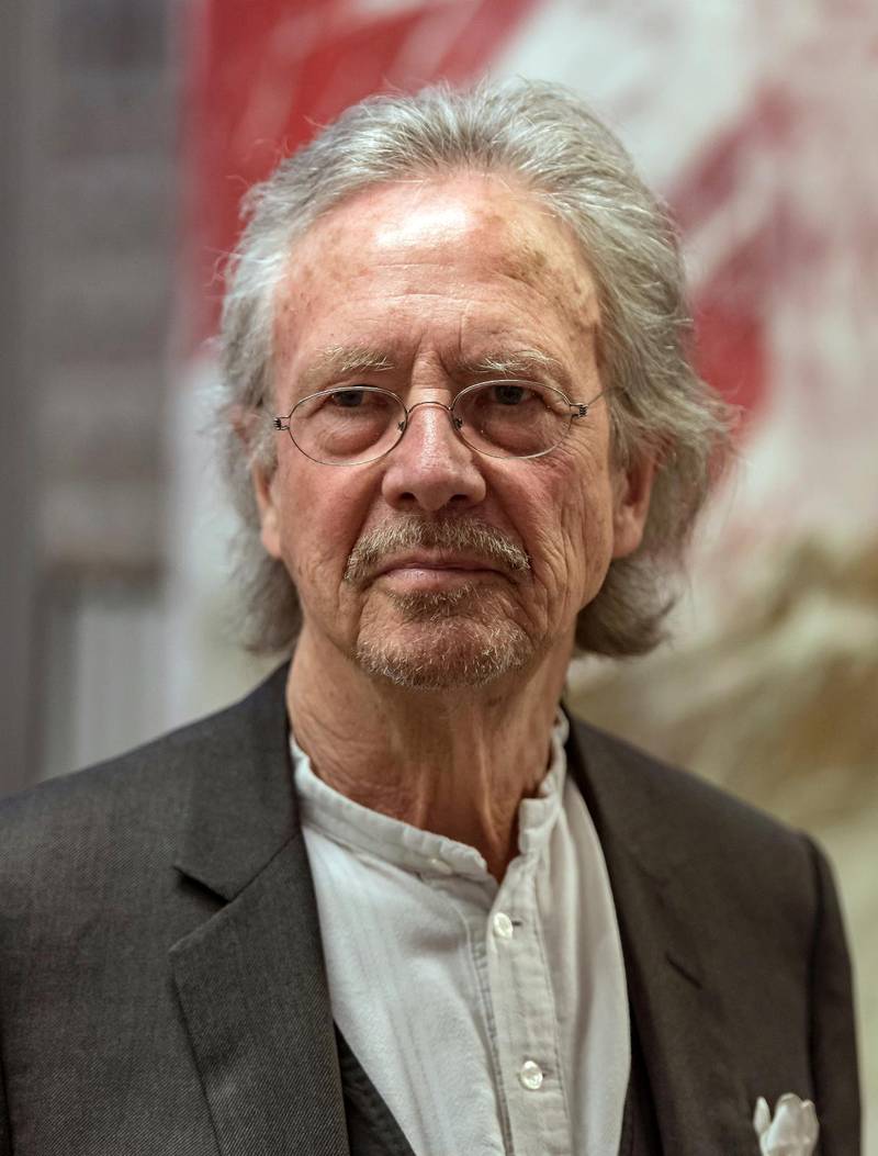 FILE -- In this March 23, 2016 photo Austrian author Peter Handke arrives for an award ceremony in Stuttgart, Germany. The winner of the 2019 Nobel Prize in literature is Austrian author Peter Handke. (Daniel Maurer/dpa via AP, file)  DSOB105