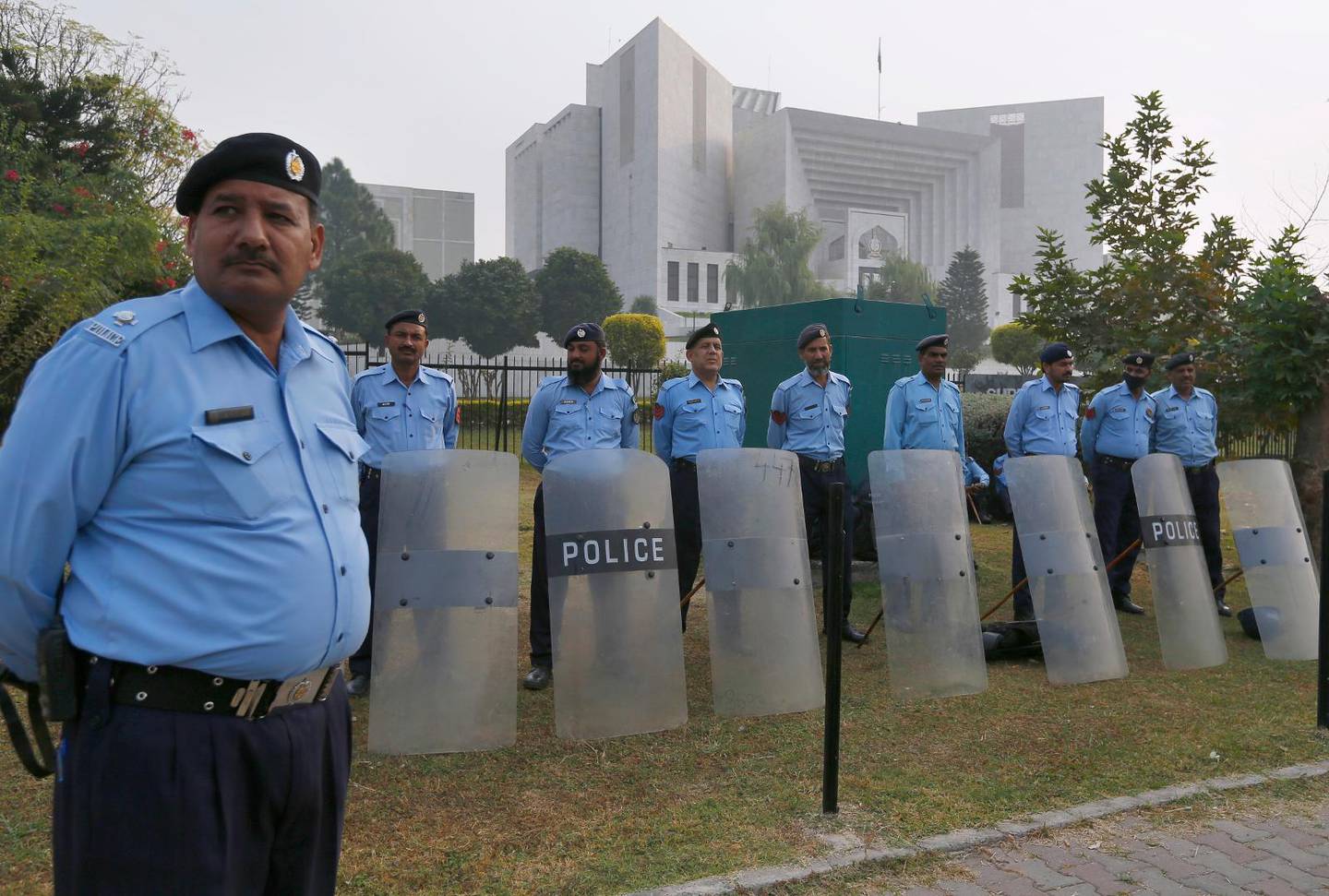 Pakistani police officers stand guard outside the supreme court in Islamabad, Pakistan, Wednesday, Oct. 31, 2018. Pakistan''s top court acquitted a Christian woman who has been on death row since 2010 for insulting Islam''s Prophet Muhammad. In Wednesday''s verdict, the court ordered authorities to free Asia Bibi. (AP Photo/Anjum Naveed)
