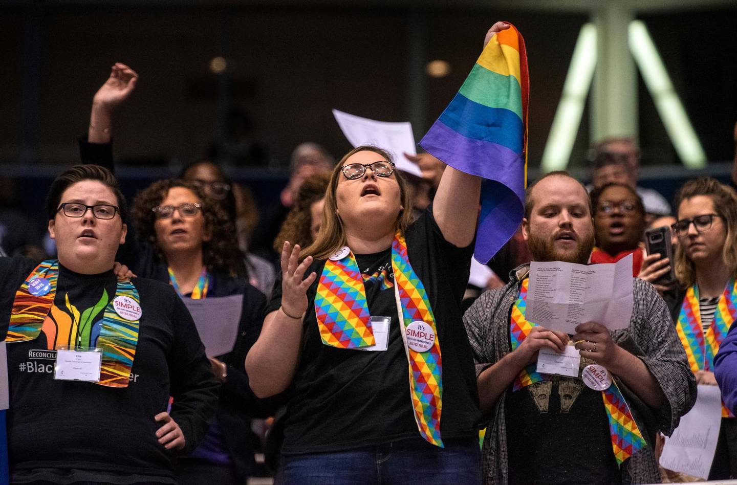 Shelby Ruch-Teegarden, center, of Garrett-Evangelical Theological Seminary joins other protestors during the United Methodist Church''s special session of the general conference in St. Louis, Tuesday, Feb. 26, 2019. America''s second-largest Protestant denomination faces a likely fracture as delegates at the crucial meeting move to strengthen bans on same-sex marriage and ordination of LGBT clergy. (AP Photo/Sid Hastings)