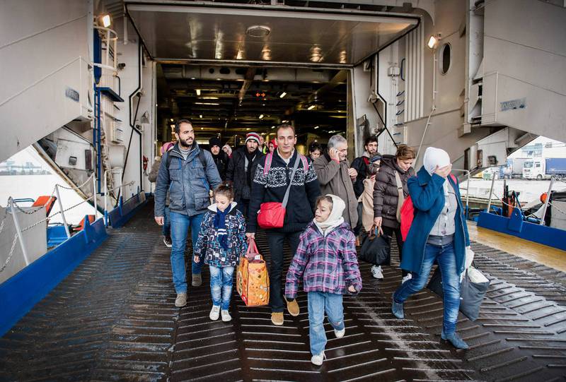 Flyktingar anländer till Trelleborg via färja från Rostock i Tyskland.