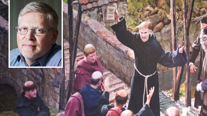 Luther predikar mot avlatshandeln på en bild från en konstutsällning i Wittenberg.