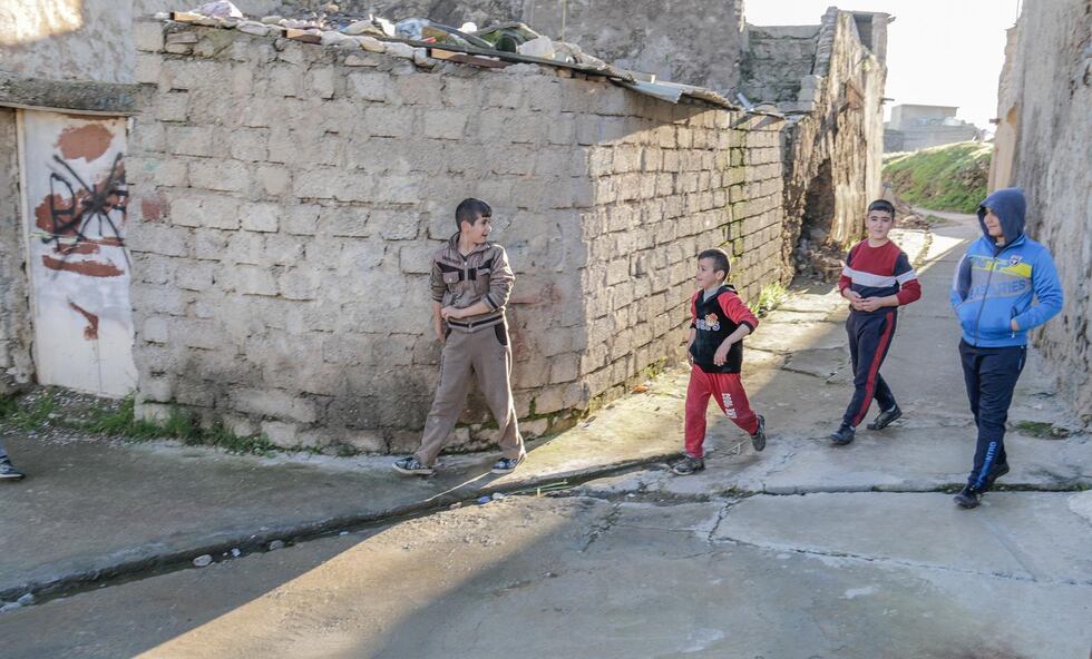 Thomas Österberg Back in the hometown. Children play again in the streets of the Christian town of Telskuf .